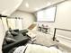Cozy media room featuring comfortable seating, a large screen, and a convenient snack bar, perfect for movie nights at 14035 Stone Key Way, Fishers, IN 46040