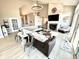 Inviting living room features vaulted ceilings, a cozy fireplace, and seamless access to an outdoor patio at 14035 Stone Key Way, Fishers, IN 46040