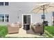 Cozy patio space with comfortable outdoor furniture, perfect for relaxation and entertaining at 1452 Bigleaf Dr, Sheridan, IN 46069