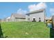 Spacious backyard with a well-maintained lawn, ideal for outdoor activities and recreation at 1452 Bigleaf Dr, Sheridan, IN 46069