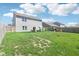 Expansive backyard with green grass, perfect for outdoor activities and Gathering fun at 1452 Bigleaf Dr, Sheridan, IN 46069