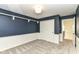 Spacious bedroom with two-tone paint, soft carpet, and a hallway entrance at 14728 Adios Pass, Carmel, IN 46032