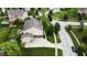 Aerial view showcasing a home with an attached two-car garage and driveway at 1476 Anon Ct, Greenwood, IN 46143