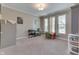 Spacious bedroom with neutral carpet, ample natural light, and versatile layout at 1476 Anon Ct, Greenwood, IN 46143