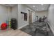 Bright home gym features modern exercise equipment and padded flooring, ready for your daily workout at 1476 Anon Ct, Greenwood, IN 46143