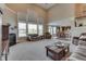 Open concept living room with large windows, fireplace, and comfortable seating at 1476 Anon Ct, Greenwood, IN 46143