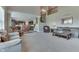 Spacious living room with a soaring ceiling, fireplace, and open floor plan at 1476 Anon Ct, Greenwood, IN 46143