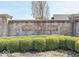Brick sign for Brighton Estates with manicured bushes in front at 1476 Anon Ct, Greenwood, IN 46143