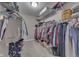 Walk-in closet featuring organized shelving, hanging racks, and ample storage space for clothing and accessories at 1476 Anon Ct, Greenwood, IN 46143
