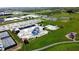 A newly built community waterpark featuring a variety of waterslides and splash pads surrounded by well-maintained green space at 1476 Anon Ct, Greenwood, IN 46143