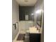 Bathroom with a modern shower and white vanity at 1512 Bellefontaine St, Indianapolis, IN 46202
