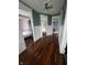 Upstairs hallway with hardwood floors and multiple doorways at 1512 Bellefontaine St, Indianapolis, IN 46202