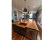 Well-appointed kitchen featuring a large copper sink and wooden island with bar stool seating at 1512 Bellefontaine St, Indianapolis, IN 46202
