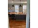 Spacious kitchen features a large island, wood countertops, and a window with natural light at 1512 Bellefontaine St, Indianapolis, IN 46202