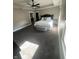 Inviting main bedroom featuring a tray ceiling, neutral walls, and ample natural light at 1512 Bellefontaine St, Indianapolis, IN 46202
