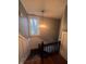Staircase with a large window at 1512 Bellefontaine St, Indianapolis, IN 46202