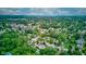 The homes, shaded by trees, form a picturesque community, with a glimpse of the city skyline on the horizon at 1517 Wallace Ave, Indianapolis, IN 46201
