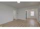 Spacious living room with hardwood floors and neutral color scheme, ready for decor at 1517 Wallace Ave, Indianapolis, IN 46201