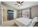 Serene bedroom with a vaulted ceiling, a calming color palette, and a window that provides natural light and views at 15369 Mystic Rock Dr, Carmel, IN 46033