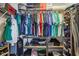 Walk in closet includes shelving for folded clothes and room for hanging garments at 15369 Mystic Rock Dr, Carmel, IN 46033