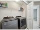 Laundry room with gray washer and dryer units at 15369 Mystic Rock Dr, Carmel, IN 46033
