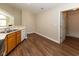 Practical kitchen featuring wood cabinets, modern appliances, and hardwood floors at 16628 Brownstone Ct, Westfield, IN 46074