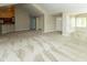 Open-concept living area featuring neutral paint, plush carpeting, and abundant natural light at 16628 Brownstone Ct, Westfield, IN 46074