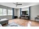 Bright living room with hardwood floors, natural light, and minimalist decor, creating a comfortable and inviting atmosphere at 1717 W 10Th St, Anderson, IN 46016