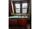 Kitchen sink with window overlooking backyard at 1806 Union St, Columbus, IN 47201