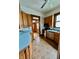 Well-lit kitchen with stainless steel appliances and oak cabinets for a classic aesthetic and ample storage at 1806 Union St, Columbus, IN 47201