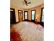 Bright living room with hardwood floors, large windows, and unique architectural details at 1806 Union St, Columbus, IN 47201