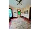 Spacious living room with hardwood floors and large windows providing ample natural light at 1806 Union St, Columbus, IN 47201