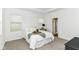Cozy bedroom featuring natural light, neutral colors and a tray ceiling at 1829 James Pierce Dr, Shelbyville, IN 46176