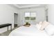 Bright bedroom features a tray ceiling, neutral colors and bright window views at 1829 James Pierce Dr, Shelbyville, IN 46176