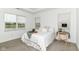Inviting bedroom features a tray ceiling and ample natural light at 1829 James Pierce Dr, Shelbyville, IN 46176