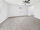 Cozy bedroom with plush carpeting, neutral walls, and ample natural light at 225 S Carthage Rd, Charlottesville, IN 46117