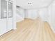 Spacious living area featuring light colored flooring, and an abundance of natural light at 225 S Carthage Rd, Charlottesville, IN 46117