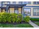 Inviting front porch with lush greenery, showcasing the entrance of a well-maintained property at 2260 Central Ave, Indianapolis, IN 46205