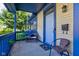 Cozy front porch with outdoor seating and a welcoming entrance to a well-maintained home at 2260 Central Ave, Indianapolis, IN 46205