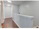 Hallway with wood flooring and neutral-colored walls at 2260 Central Ave, Indianapolis, IN 46205