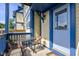 Outdoor patio includes dining for two with seating overlooking the tranquil yard space at 2260 Central Ave, Indianapolis, IN 46205