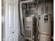 Furnace and hot water heater in the utility closet at 2260 Central Ave, Indianapolis, IN 46205