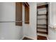 Walk-in closet with wood shelving and wooden floors at 2260 Central Ave, Indianapolis, IN 46205