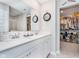 Bathroom featuring double vanity, walk-in closet, and a separate glass-enclosed shower at 3016 Gibbert Ln, Westfield, IN 46074