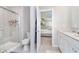 Bathroom with walk-in shower, toilet, and vanity; bedroom visible through open door at 3016 Gibbert Ln, Westfield, IN 46074
