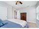 This bedroom features carpet flooring, a ceiling fan, and a modern dresser at 3016 Gibbert Ln, Westfield, IN 46074