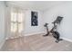 Home gym showcasing neutral walls, carpeted floors, and an exercise bike at 3016 Gibbert Ln, Westfield, IN 46074