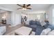 Bright living room with an open layout leading to the kitchen and dining area at 3016 Gibbert Ln, Westfield, IN 46074