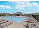 Community pool boasts lounge chairs and a covered outdoor seating area at 3016 Gibbert Ln, Westfield, IN 46074