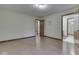 Bright bedroom with wood-look floors, ensuite bathroom, and walk in closet at 31 N Restin Rd, Greenwood, IN 46142